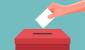 Picture of a hand putting a ballot paper into a ballot box